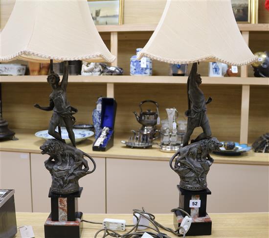 A pair of figural spelter lamps on marble plinths height excl. shade 57cm